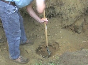 Small holes are dug for testing percolation