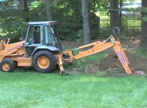 Perc test - backhoe digs a series of holes